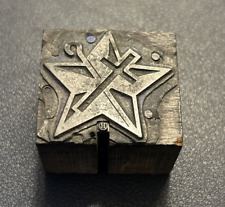 Star with cross-- vintage letterpress printing block picture